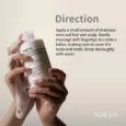 NIDA Ultimate Hair-Bonding sampon kézben, habbal