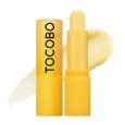 TOCOBO Vitamin Nourishing Lip Balm 3,5 g sárga stift balzsamtextúrával fehér háttéren